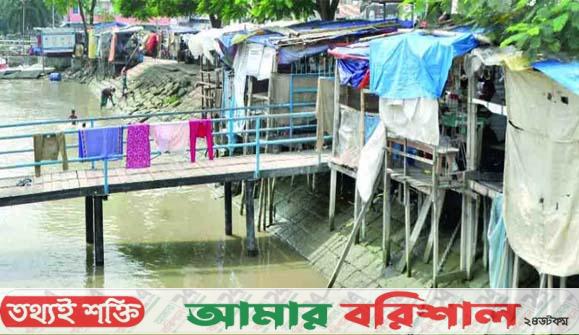  কীর্তনখোলা নদীর তীরজুড়ে বাড়ছে দখল ও অব্যবস্থাপনা 